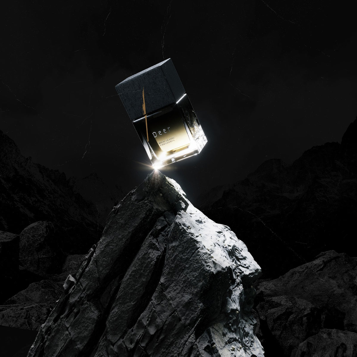 Wolf Brothers Deer eau de parfum bottle balanced on lit stone
