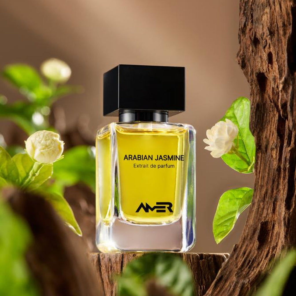 Amer Perfumes Arabian Jasmine Extrait de Parfum bottle with jasmine sambac blooms and driftwood
