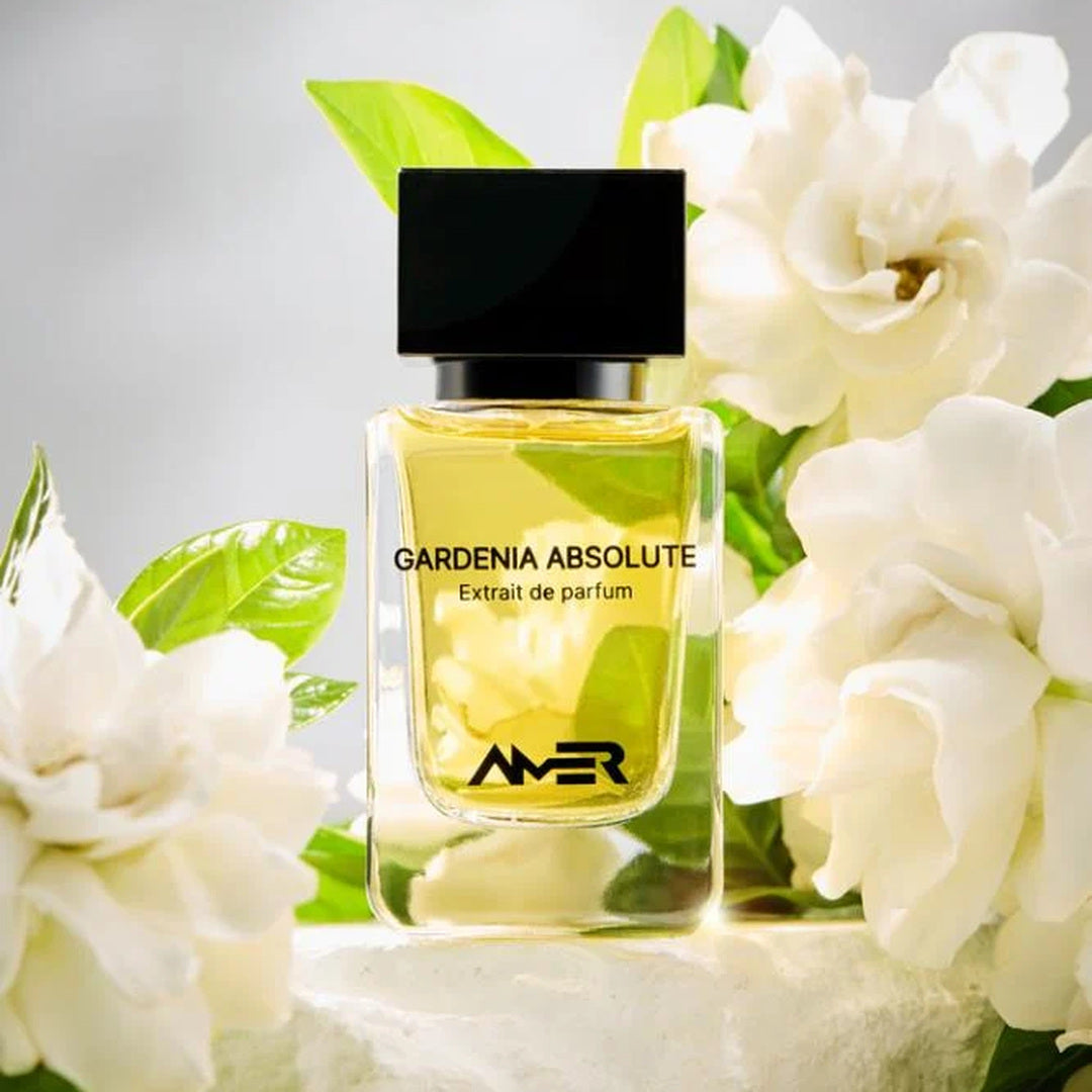 Amer Perfumes Gardenia Absolute Extrait de Parfum bottle with gardenia blooms
