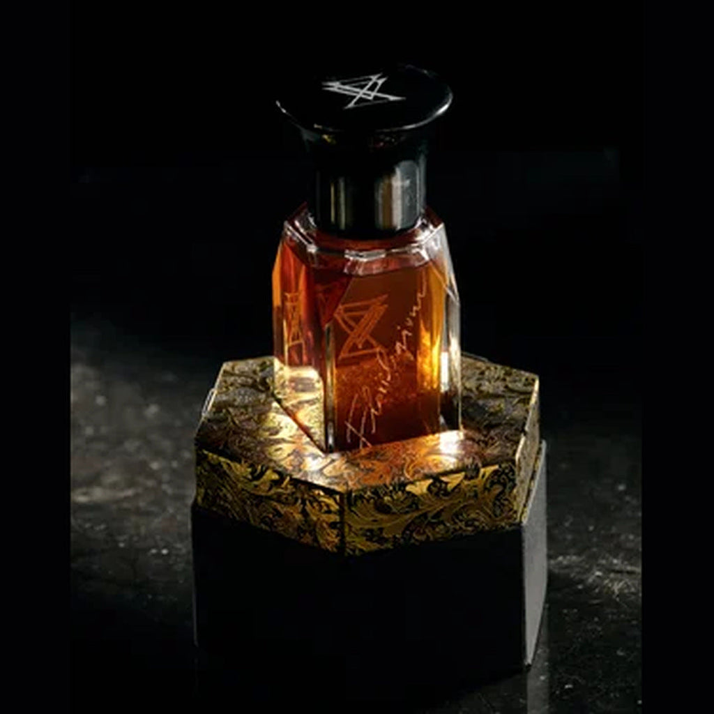Extra Virgo Florilegium bottle on its gilded plinth