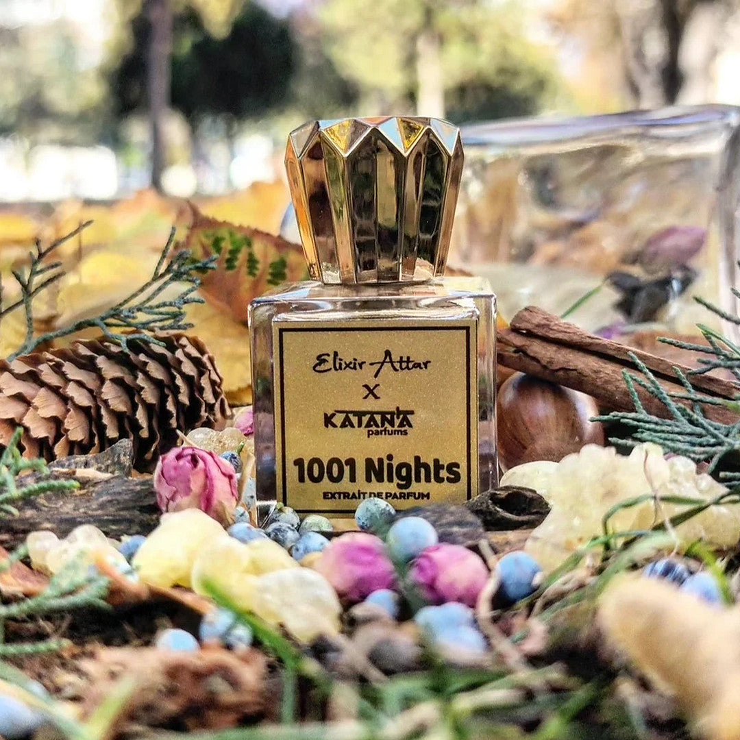 Elixir Attar and Katana Parfums 1001 Nights extrait de parfum bottle on autumn leaves