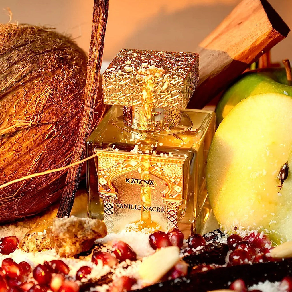 Katana Parfums Vanille Nacre parfum bottle in warm light with cinnamon and apple