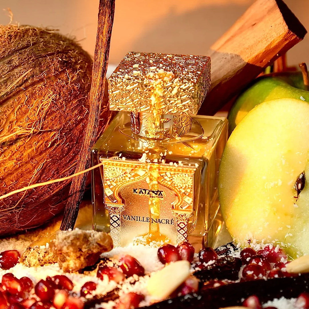 Katana Parfums Vanille Nacre parfum bottle in warm light with cinnamon and apple