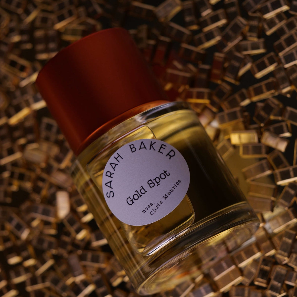 Sarah Baker Gold Spot on a bed of gold tiles