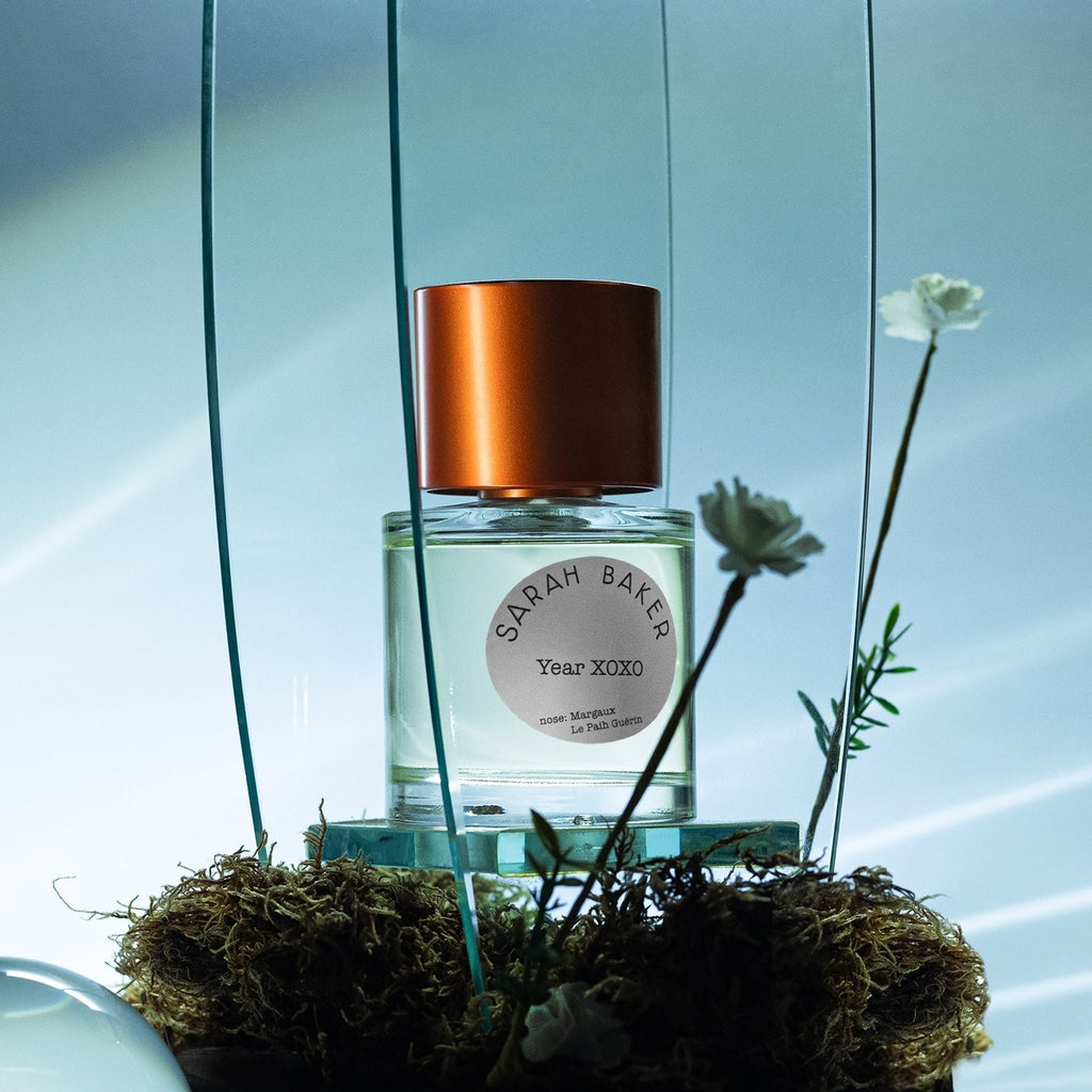 KSI Feature: Sarah Baker Year XOXO bottle on moss inside a glass cloche