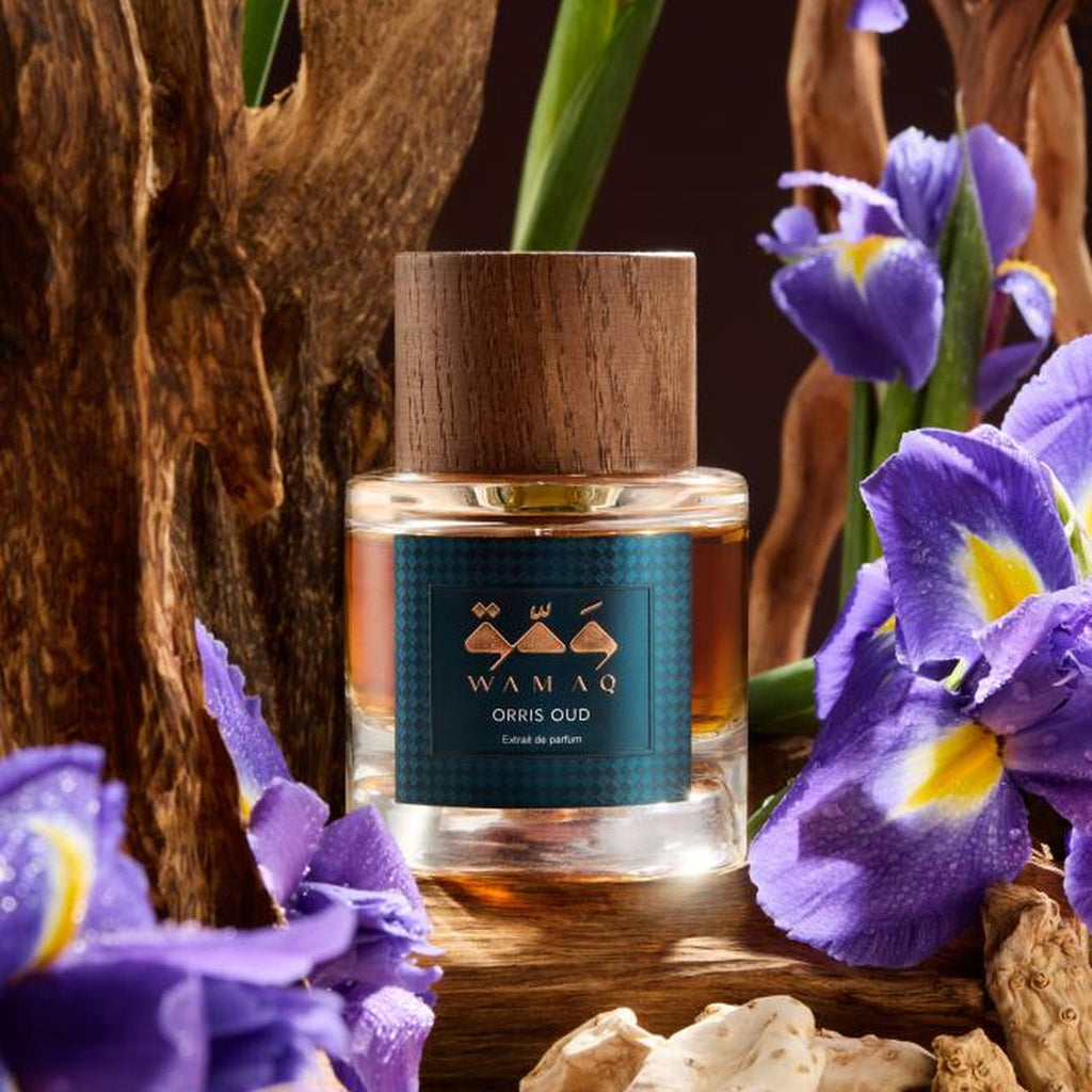 Wamaq Orris Oud Extrait de Parfum bottle with iris blooms, orris root and agarwood