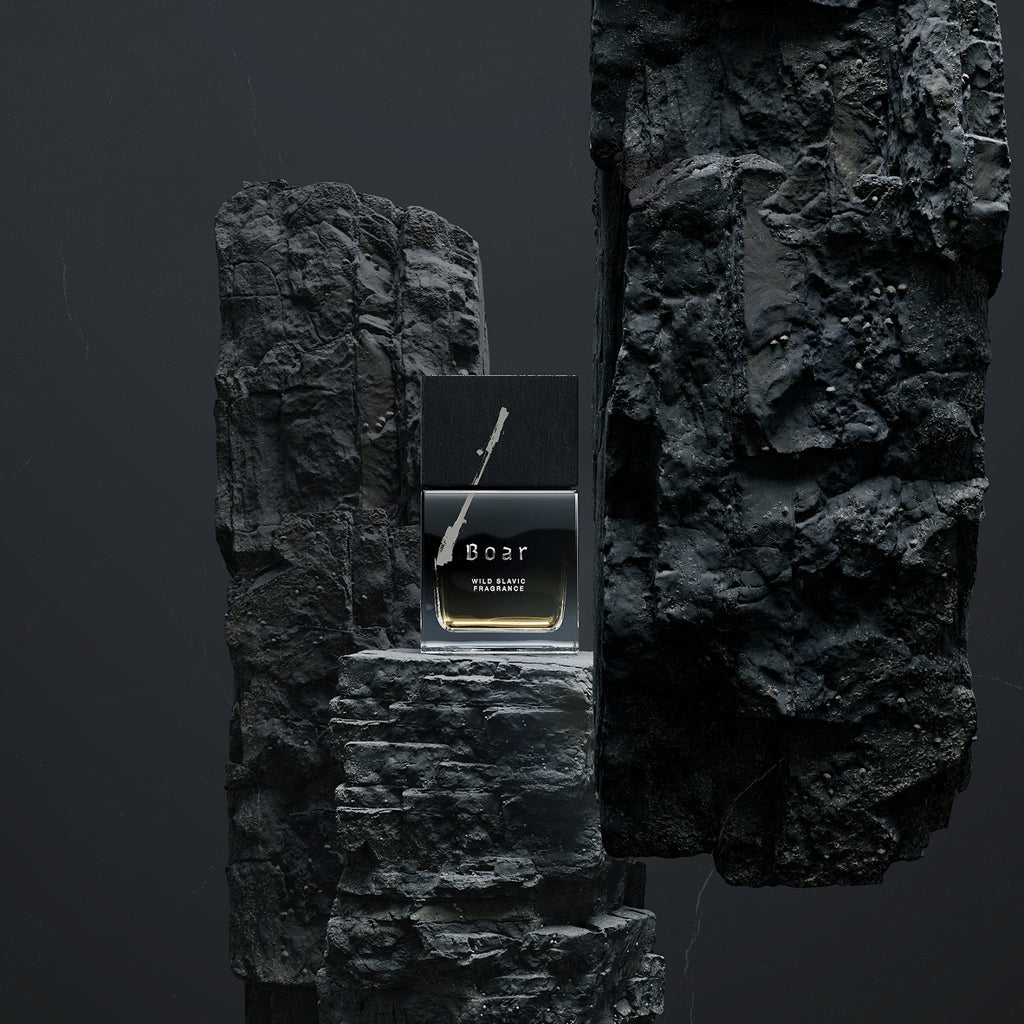 Wolf Brothers Boar eau de parfum bottle on a dark stone plinth