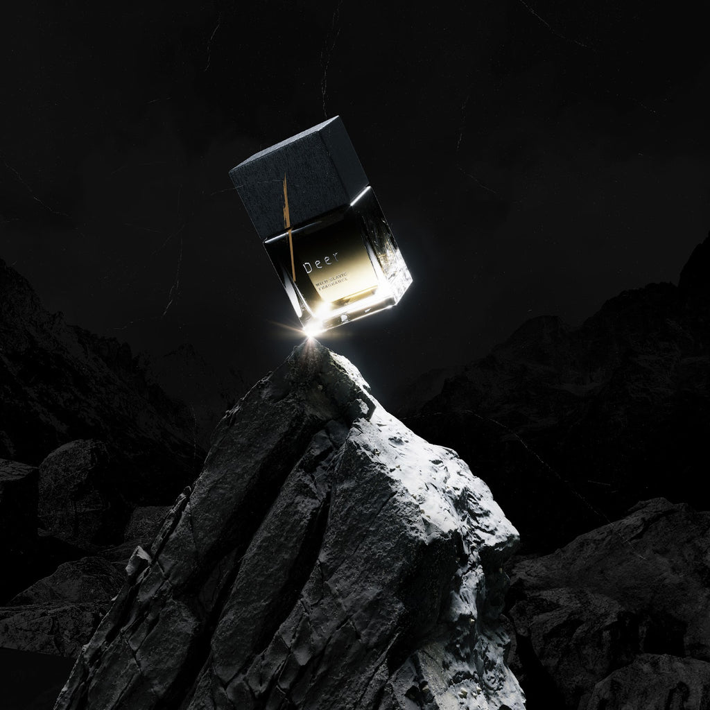 KSI Feature: Wolf Brothers Deer eau de parfum bottle balanced on lit stone