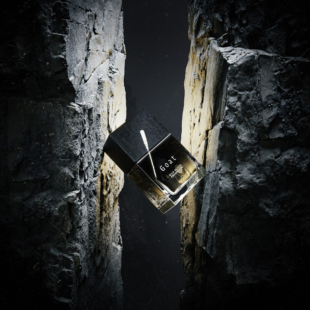 Wolf Brothers Goat eau de parfum bottle wedged in a rock crevice