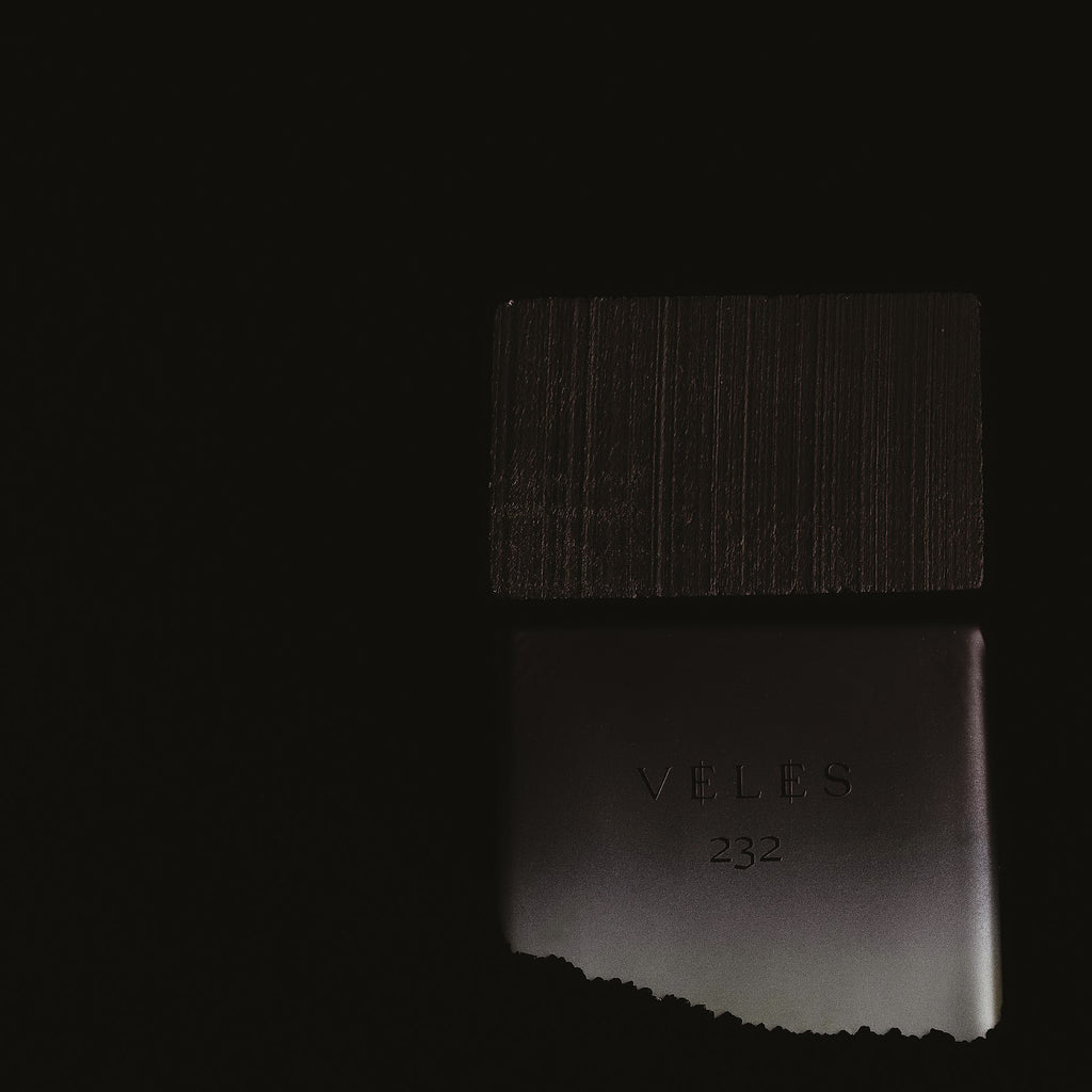 Wolf Brothers Veles eau de parfum bottle on dark wet ground